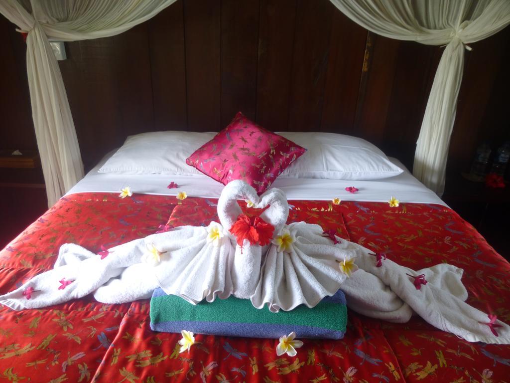 Отель Joglo Taman Sari Убуд Экстерьер фото